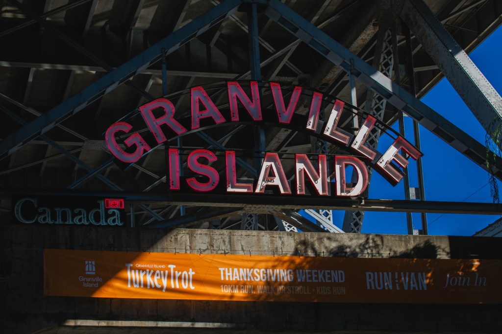 The Granville Island Neon sign greets drivers as they enter the island.