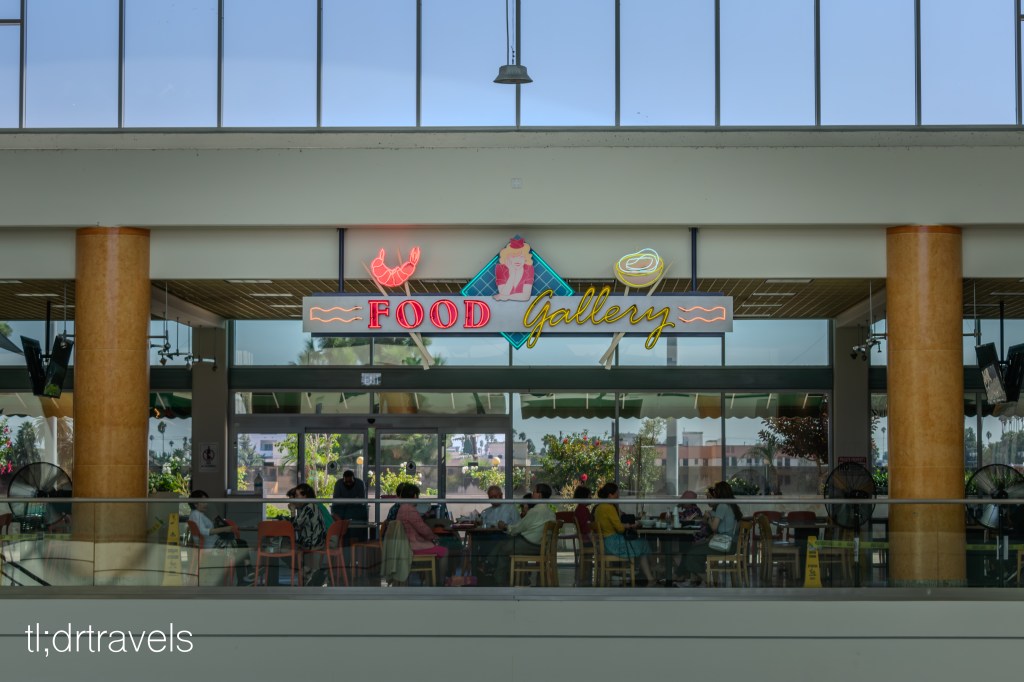 The food gallery sign at Koreatown Galleria is a popular gathering place for those who live in the area.